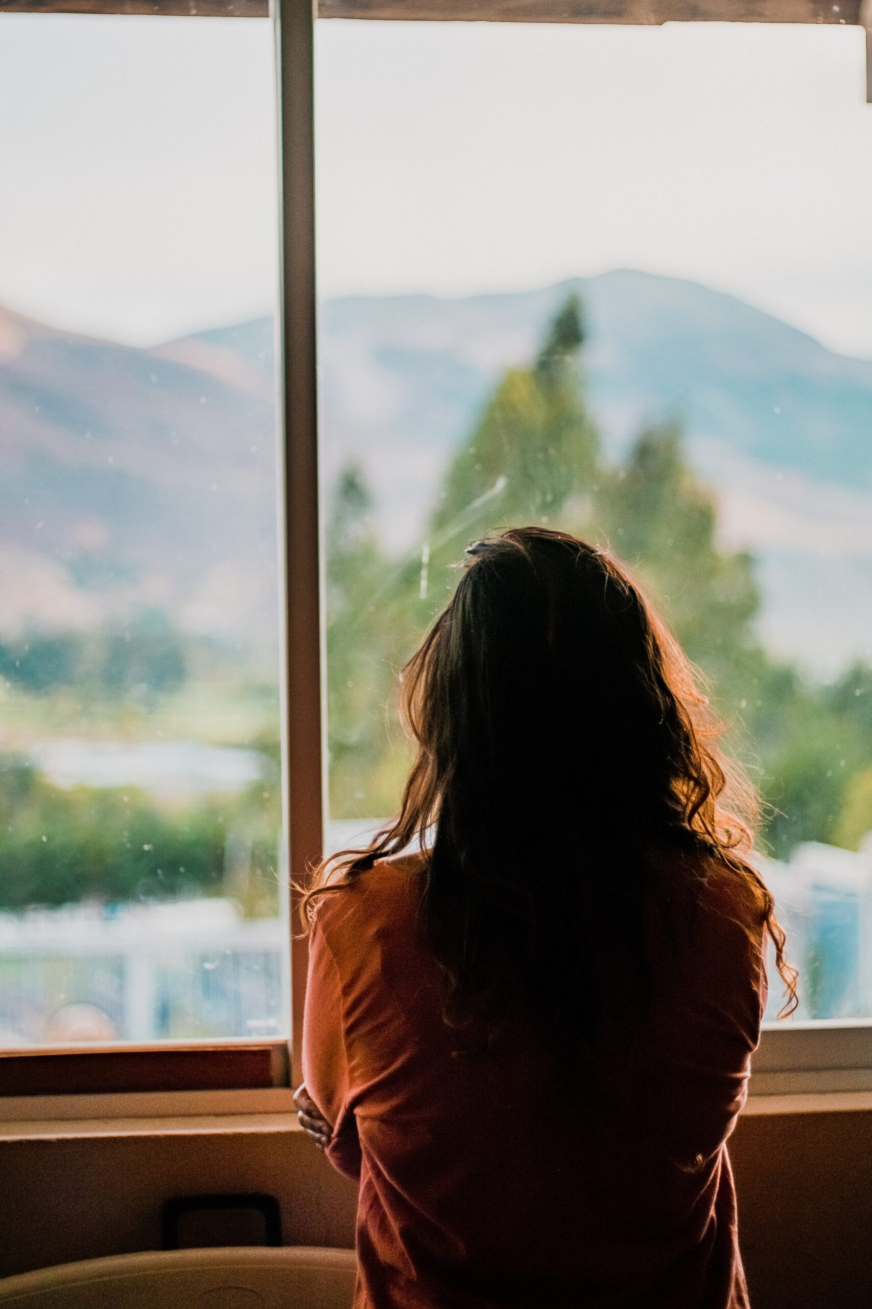 a lonely looking out of the window