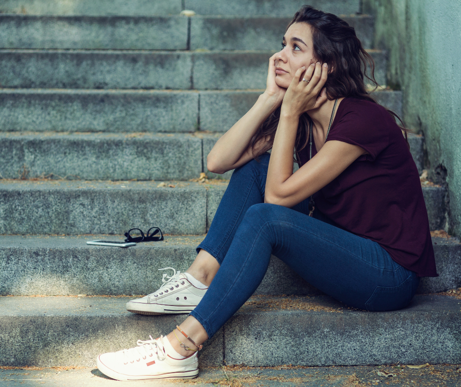 girl sitting on steps